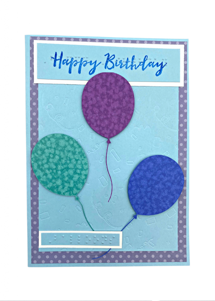the happy birthday card is isolated on a white backdrop