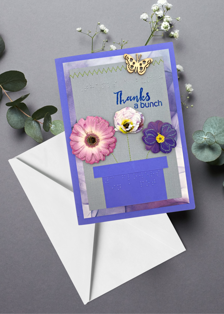 the thanks a bunch card with a white envelope on a neutral grey backdrop